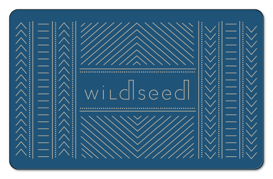 Wildseed logo on a tan background